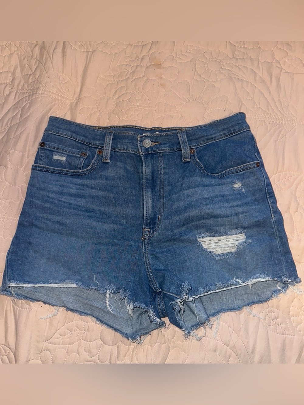 Levi’s High-rise blue distressed shorts